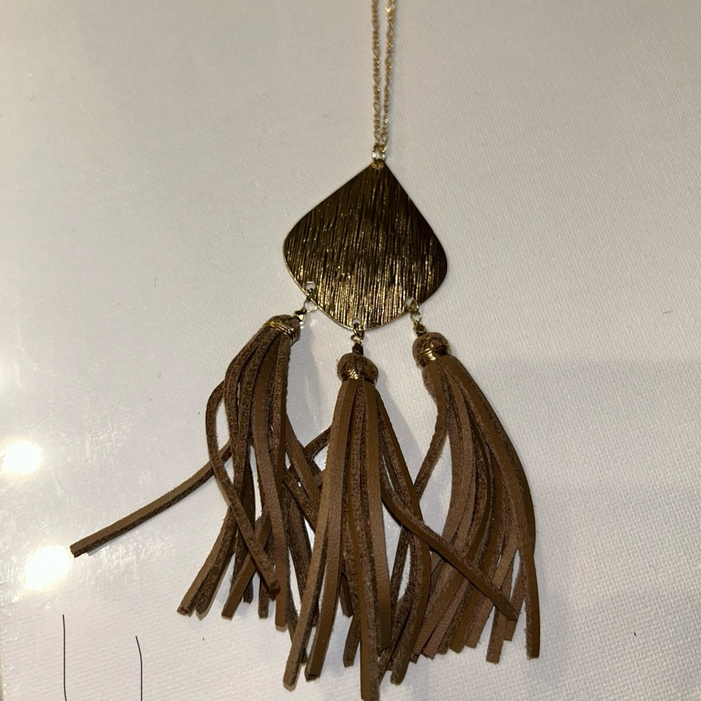 Stunning long gold necklace